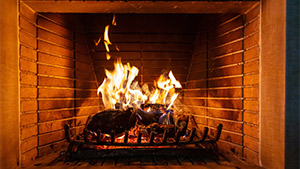 A fire in a fireplace is dangerous and causes house fires