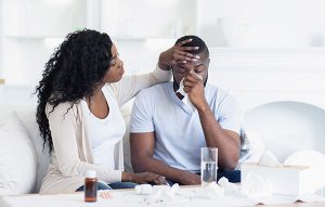 Image of person suffering from the impacts of mold in the air