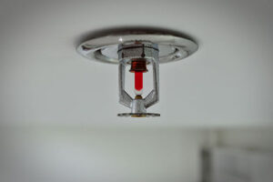 Emergency fire sprinkler which can help mitigate the fire damage cleanup process.